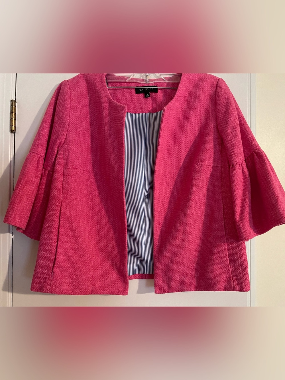 Very pretty pink Talbots swing coat. 
Size 6